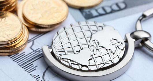 Coins, paper money and globe on white Statistic form background